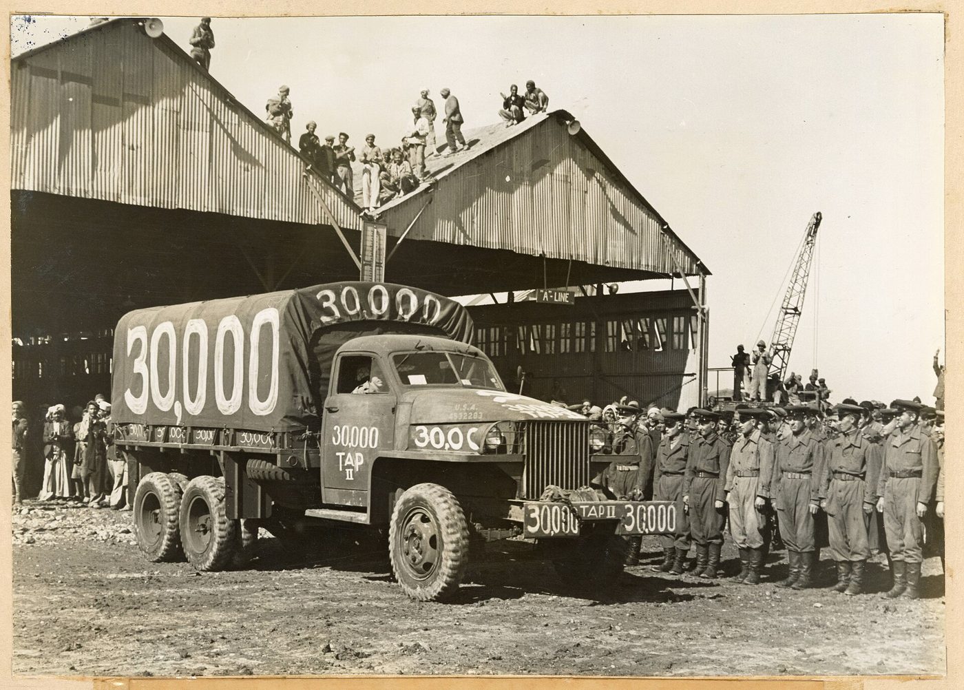 Soviet and American soldiers at a Lend-Lease truck assembly plant in Iran